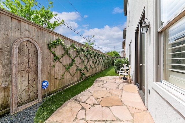 view of patio with a fenced backyard