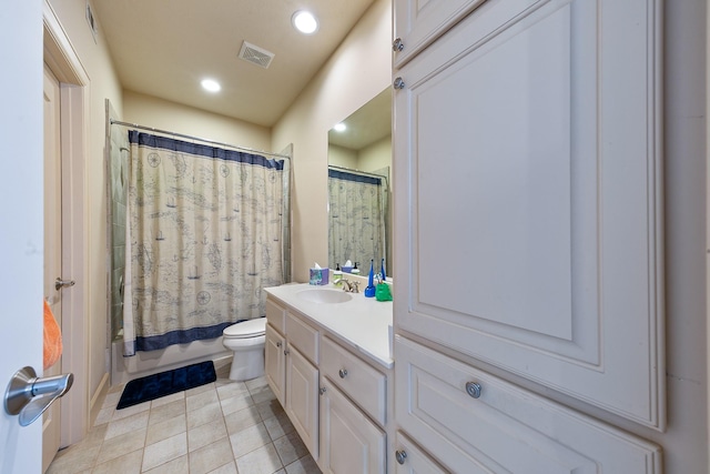 bathroom with visible vents, tile patterned flooring, vanity, toilet, and recessed lighting
