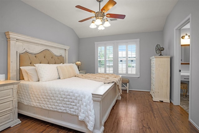 bedroom with baseboards, a ceiling fan, dark wood finished floors, and lofted ceiling