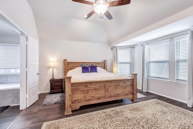 bedroom with a ceiling fan, baseboards, vaulted ceiling, dark wood-type flooring, and visible vents