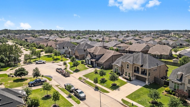 drone / aerial view with a residential view