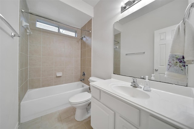 full bath featuring tile patterned floors, washtub / shower combination, vanity, and toilet