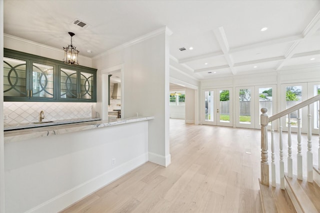 bar featuring tasteful backsplash, light wood-style floors, recessed lighting, beam ceiling, and coffered ceiling