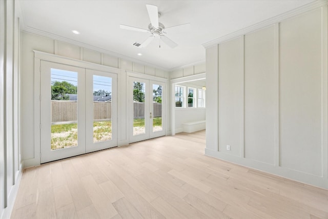 unfurnished sunroom with french doors