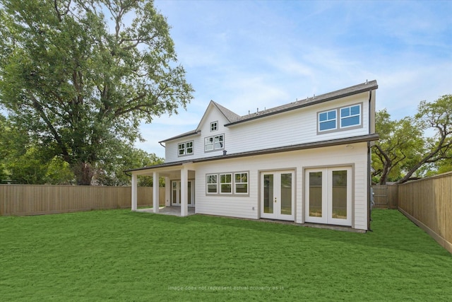 back of house with french doors