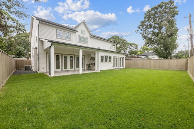 5518 Schumacher Ln, Houston, TX 77056 - back of property featuring a fenced backyard and a patio area