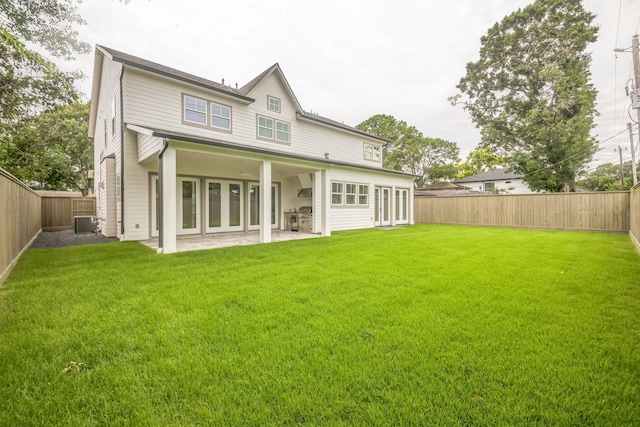 5518 Schumacher Ln, Houston, TX 77056 - back of house with a fenced backyard and a patio