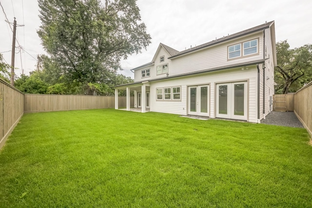 5518 Schumacher Ln, Houston, TX 77056 - rear view of property featuring french doors and a fenced backyard