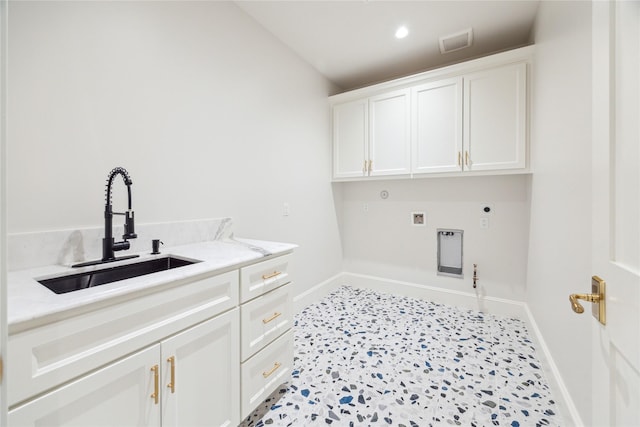 5518 Schumacher Ln, Houston, TX 77056 - laundry area with hookup for a gas dryer, cabinet space, washer hookup, and electric dryer hookup