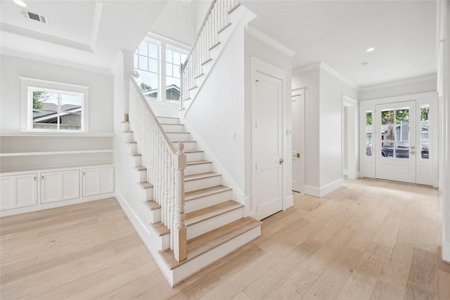 5518 Schumacher Ln, Houston, TX 77056 - staircase featuring wood finished floors, plenty of natural light, ornamental molding, and recessed lighting