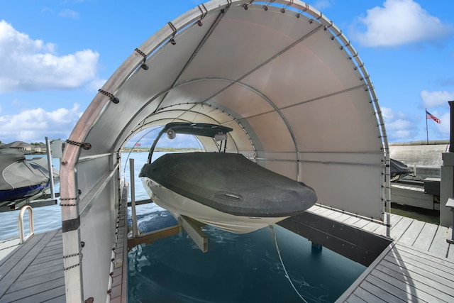 12858 Pelican Island Dr, Willis, TX 77318 - dock area featuring boat lift