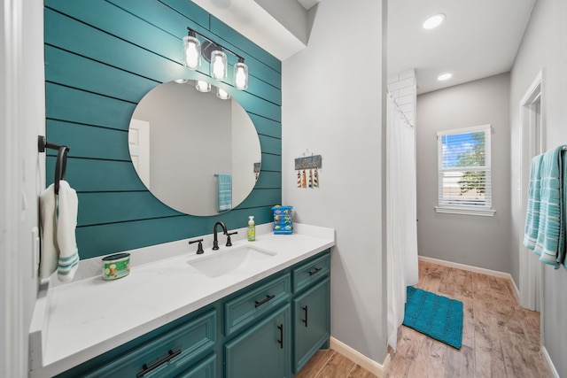 12858 Pelican Island Dr, Willis, TX 77318 - bathroom with vanity, recessed lighting, baseboards, and wood finished floors