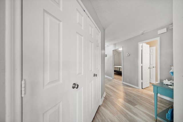 12858 Pelican Island Dr, Willis, TX 77318 - hall with light wood-style floors and baseboards