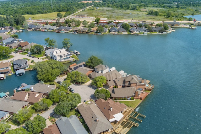 12858 Pelican Island Dr, Willis, TX 77318 - drone / aerial view with a water view and a residential view
