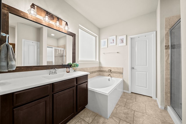 bathroom with a garden tub, tile patterned flooring, vanity, and a shower stall