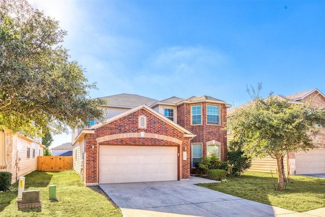 traditional home featuring driveway, brick siding, fence, a front lawn, and an attached garage