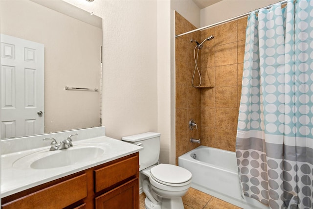 full bath featuring toilet, tile patterned flooring, shower / bath combo, and vanity