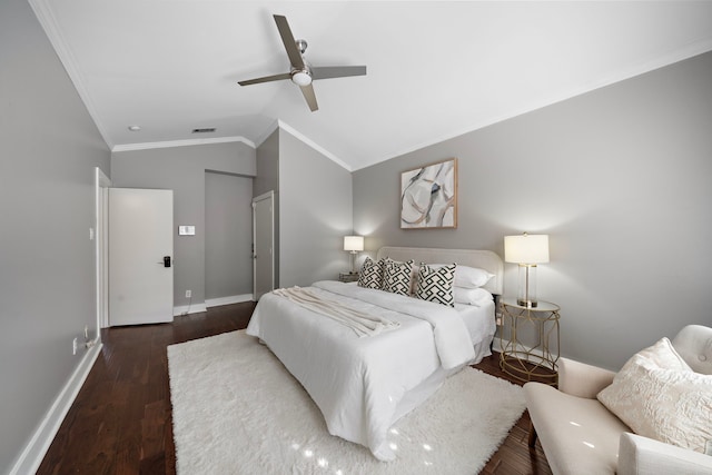 bedroom with visible vents, wood finished floors, baseboards, lofted ceiling, and ornamental molding