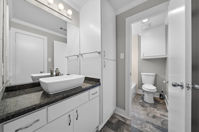 bathroom with vanity, toilet, baseboards, visible vents, and ornamental molding
