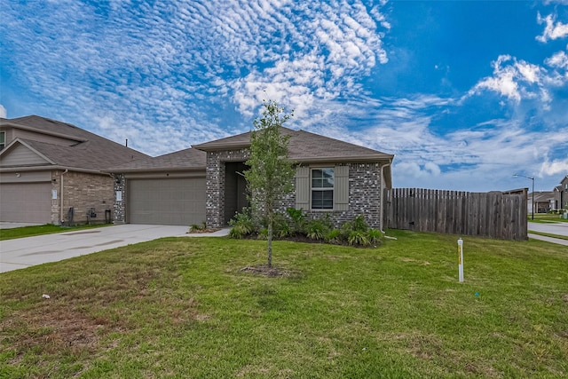 view of front facade with a garage, fence, a front lawn, concrete driveway, and stone siding