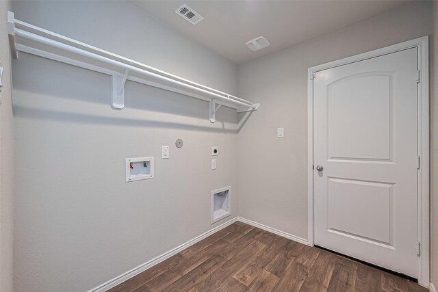 laundry room featuring laundry area, visible vents, hookup for an electric dryer, dark wood finished floors, and washer hookup