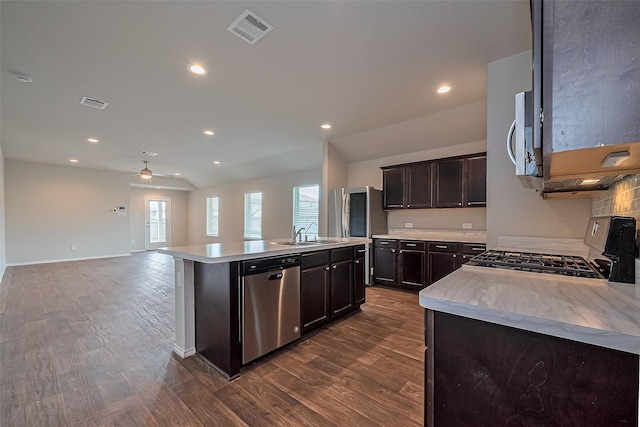 kitchen with visible vents, ceiling fan, light countertops, a sink, and stainless steel appliances