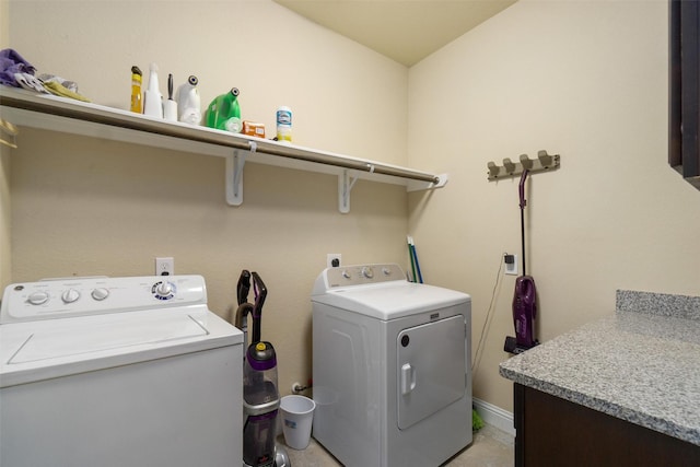 washroom with laundry area and washer and clothes dryer