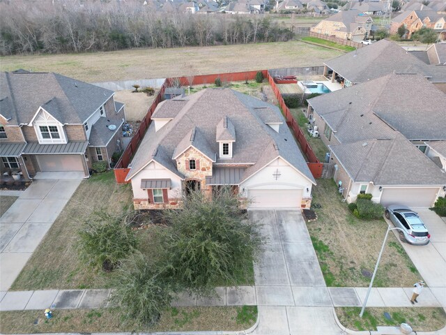 drone / aerial view with a residential view