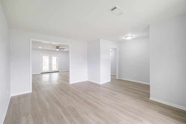 4314 Woodmont Dr, Houston, TX 77045 - unfurnished room featuring ceiling fan, light wood finished floors, french doors, baseboards, and visible vents