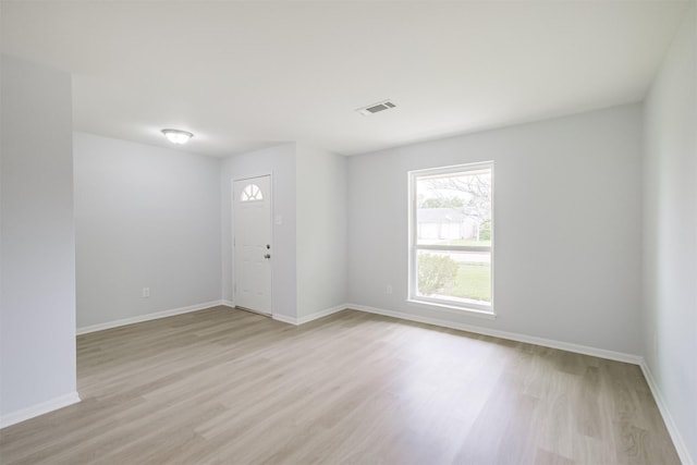 4314 Woodmont Dr, Houston, TX 77045 - empty room with baseboards, light wood finished floors, and visible vents
