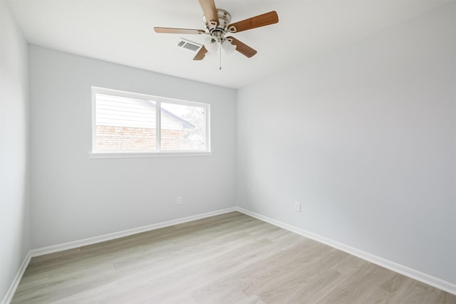 4314 Woodmont Dr, Houston, TX 77045 - empty room featuring baseboards, a ceiling fan, light wood-style flooring, and visible vents
