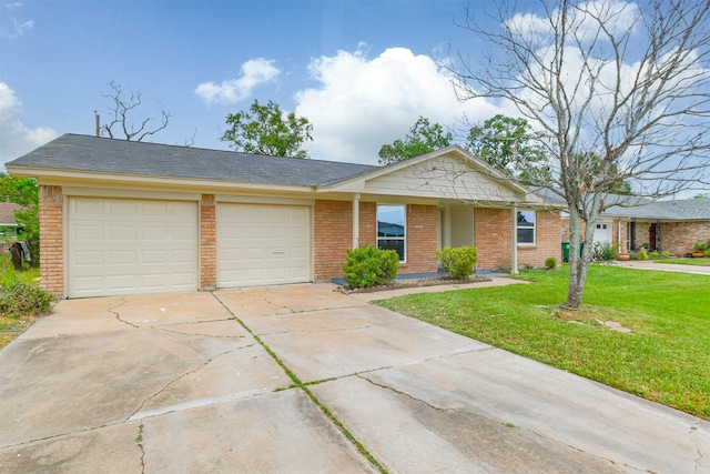 4314 Woodmont Dr, Houston, TX 77045 - ranch-style home with an attached garage, concrete driveway, a front lawn, and brick siding