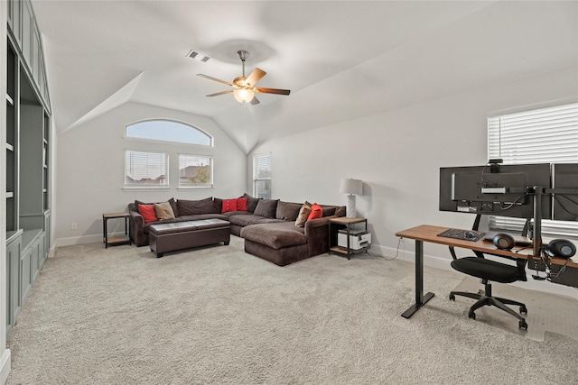 office space with carpet flooring, ceiling fan, visible vents, and baseboards