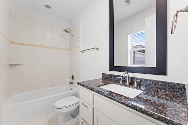 bathroom featuring visible vents, tile patterned flooring, vanity, toilet, and tub / shower combination