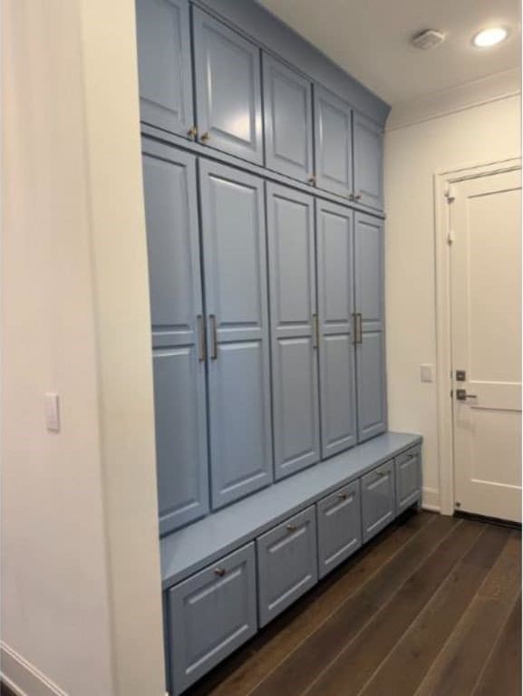mudroom with baseboards, recessed lighting, dark wood finished floors, and ornamental molding