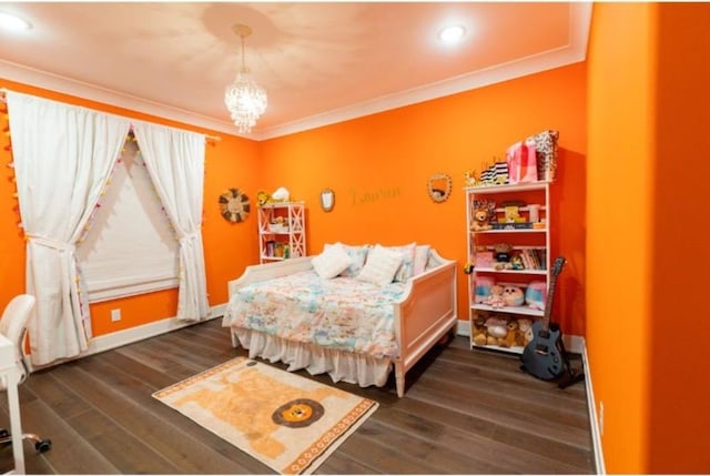 bedroom with an inviting chandelier, baseboards, crown molding, and dark wood-style flooring