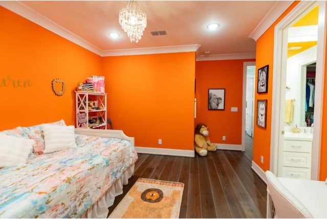bedroom with visible vents, hardwood / wood-style flooring, baseboards, a notable chandelier, and ornamental molding