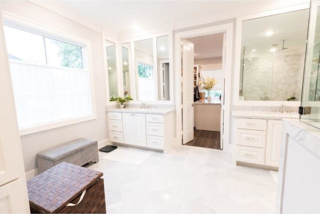 bathroom featuring vanity, recessed lighting, and a shower stall
