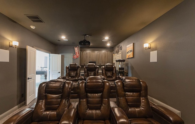 home theater room with recessed lighting, baseboards, and visible vents