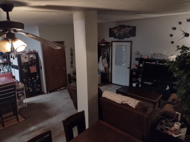 interior space featuring a ceiling fan
