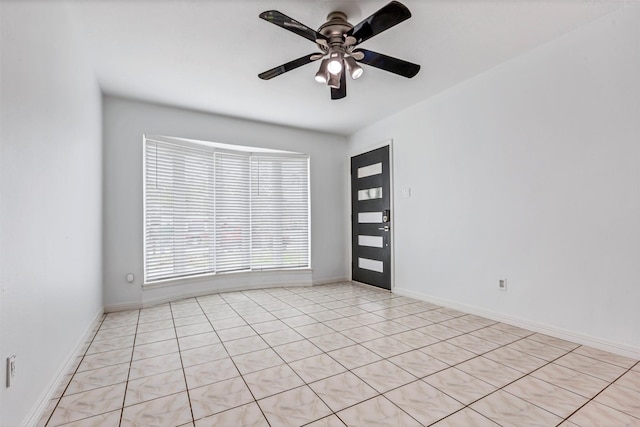 unfurnished room with ceiling fan