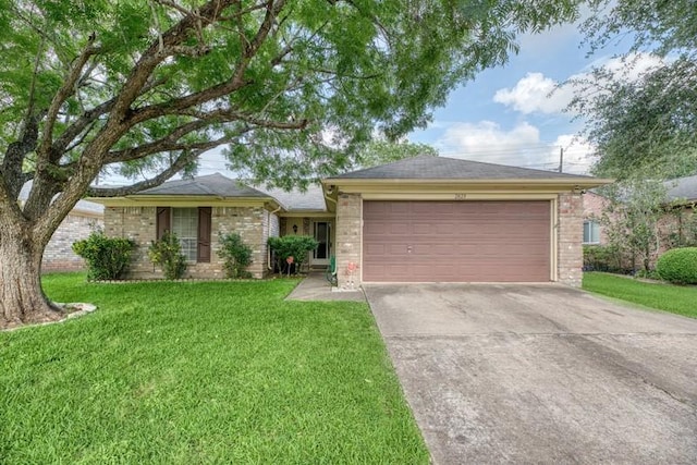 ranch-style home with concrete driveway, brick siding, an attached garage, and a front lawn