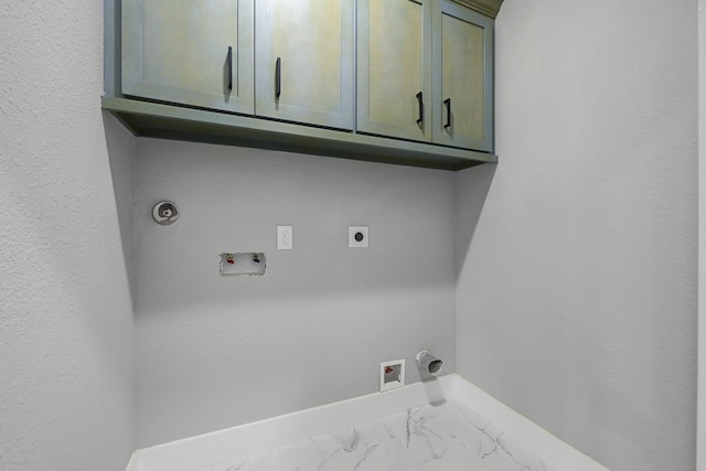 5134 Breckenridge Dr, Houston, TX 77066 - laundry room featuring marble finish floor, baseboards, washer hookup, cabinet space, and hookup for an electric dryer