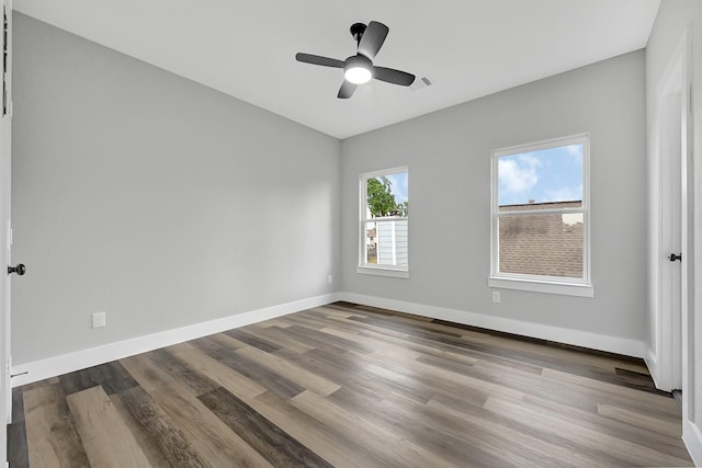 5134 Breckenridge Dr, Houston, TX 77066 - spare room featuring baseboards, visible vents, and wood finished floors