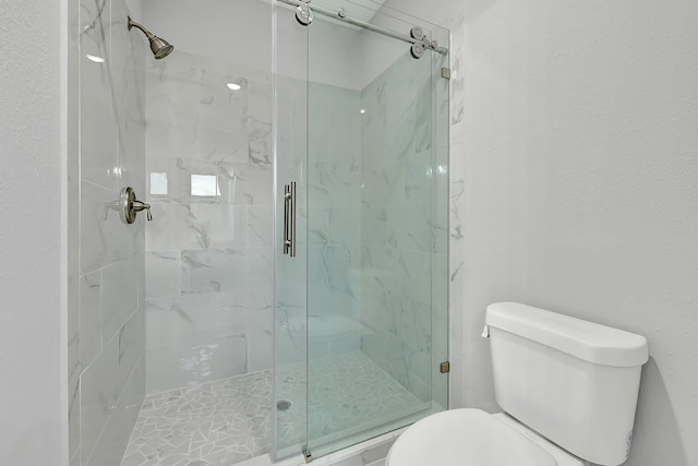 5134 Breckenridge Dr, Houston, TX 77066 - bathroom featuring a shower stall and toilet
