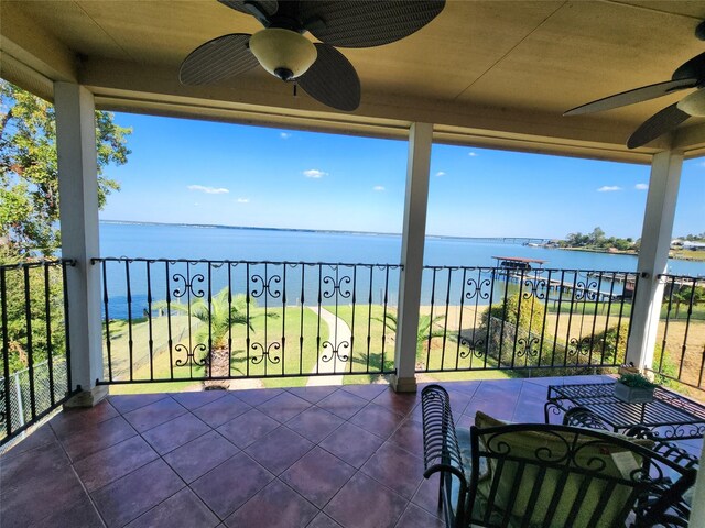 231 Key Largo Loop, Point Blank, TX 77364 - balcony with a ceiling fan and a water view