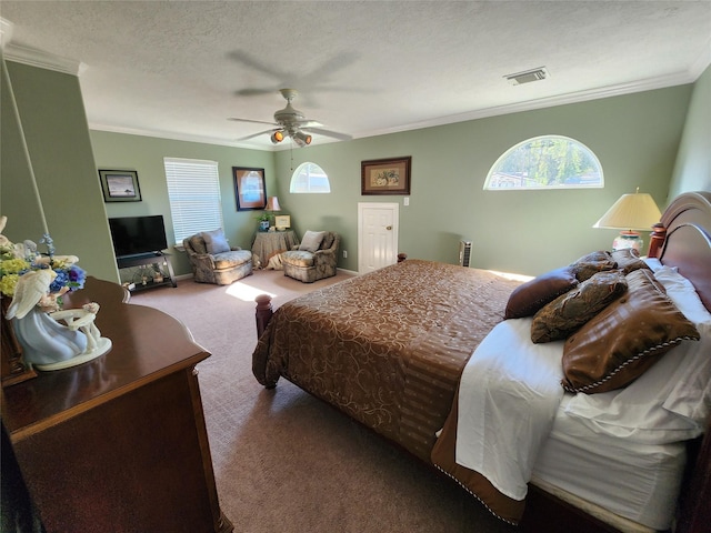 231 Key Largo Loop, Point Blank, TX 77364 - carpeted bedroom with crown molding, ceiling fan, visible vents, and multiple windows