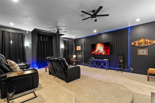carpeted home theater featuring baseboards, a ceiling fan, and recessed lighting