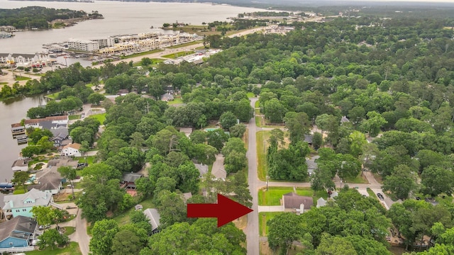 birds eye view of property featuring a water view