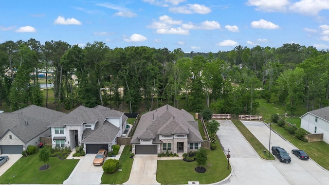 birds eye view of property with a residential view